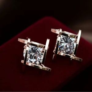 A Pair Of Men's Abstract Square Faux Diamond Stud Earrings